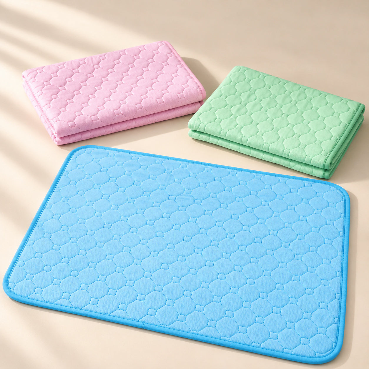 Blue, pink, and green KoloPad color options displayed together